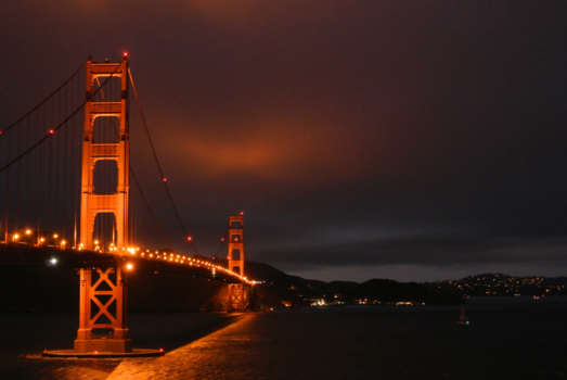 San Francisco - Golden gate bridge with golden sky.