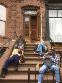 Harlem - Harlem: locals sitting on the stairs